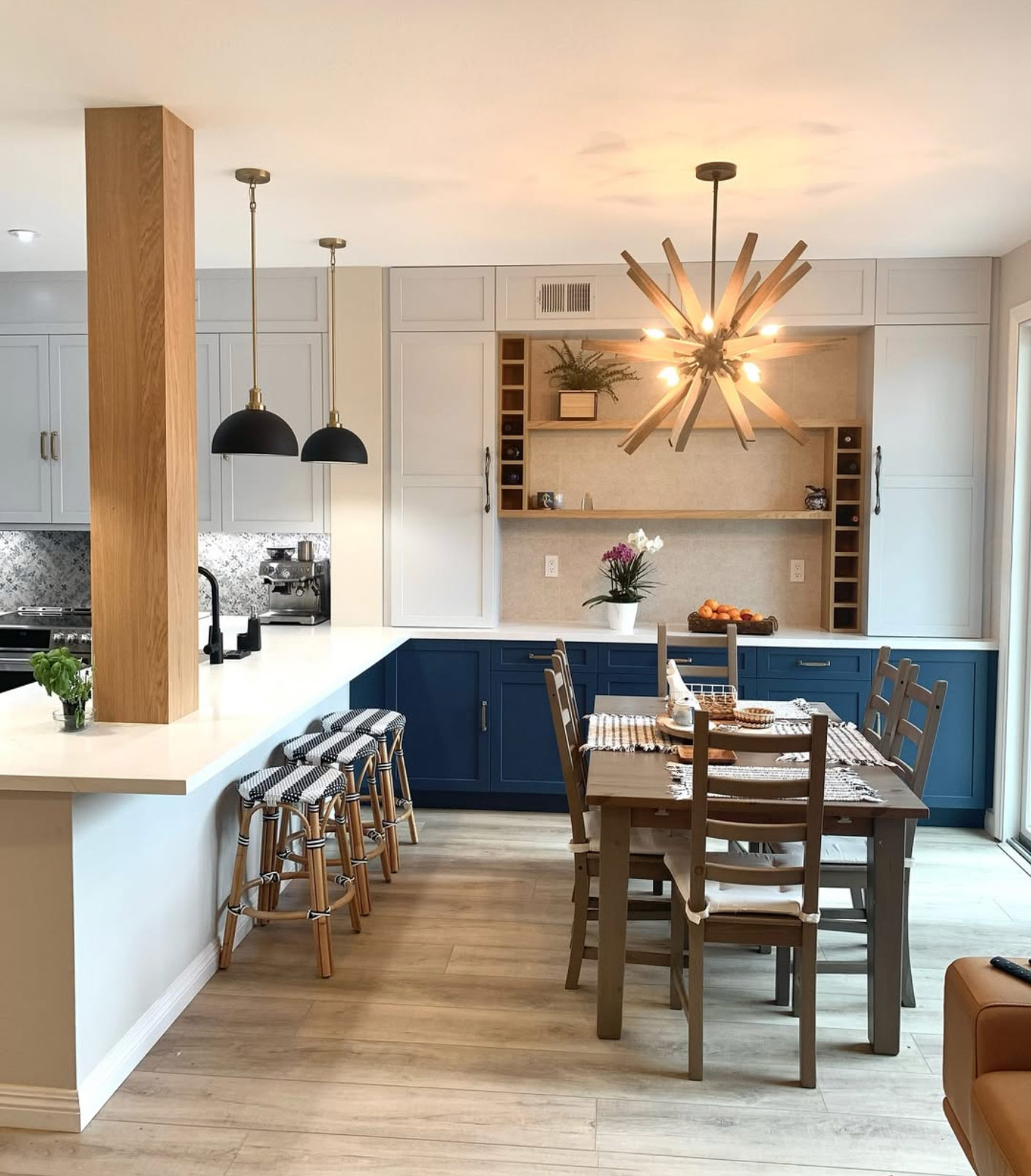 living room remodeling by OK construction and remodeling featuring dark blue cabinets, wood panels flooring, wood table, and lightning