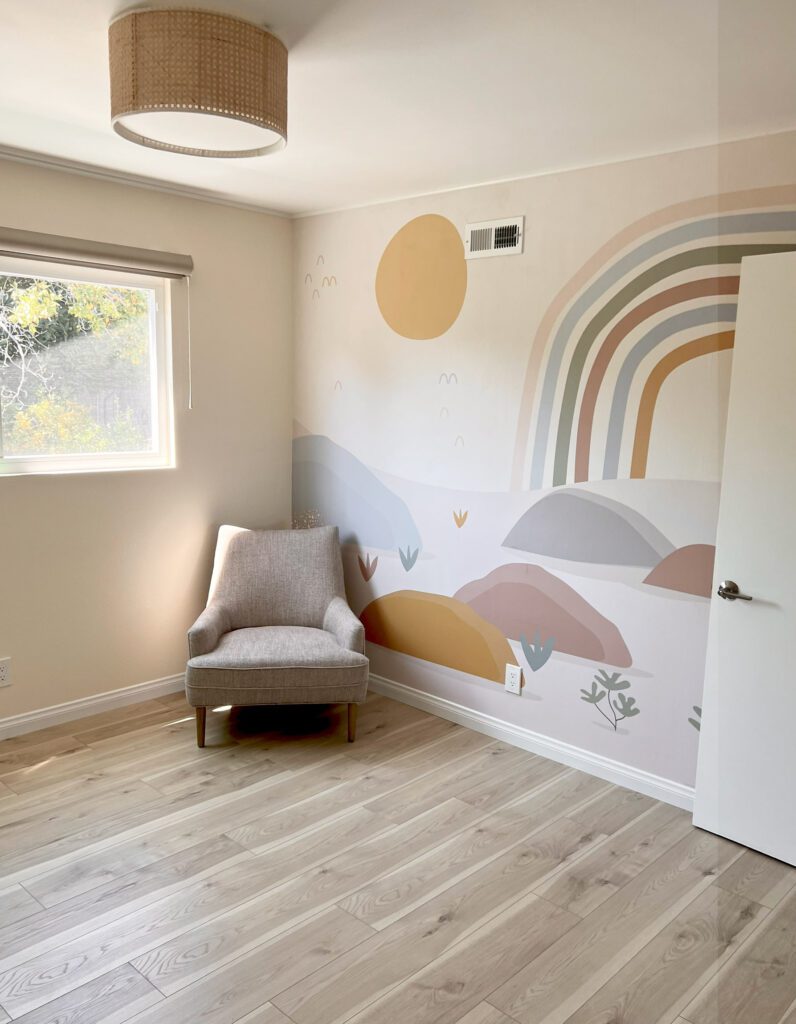 bedroom remodeling: painted wall, a chair in the corner, new flooring, new lightning