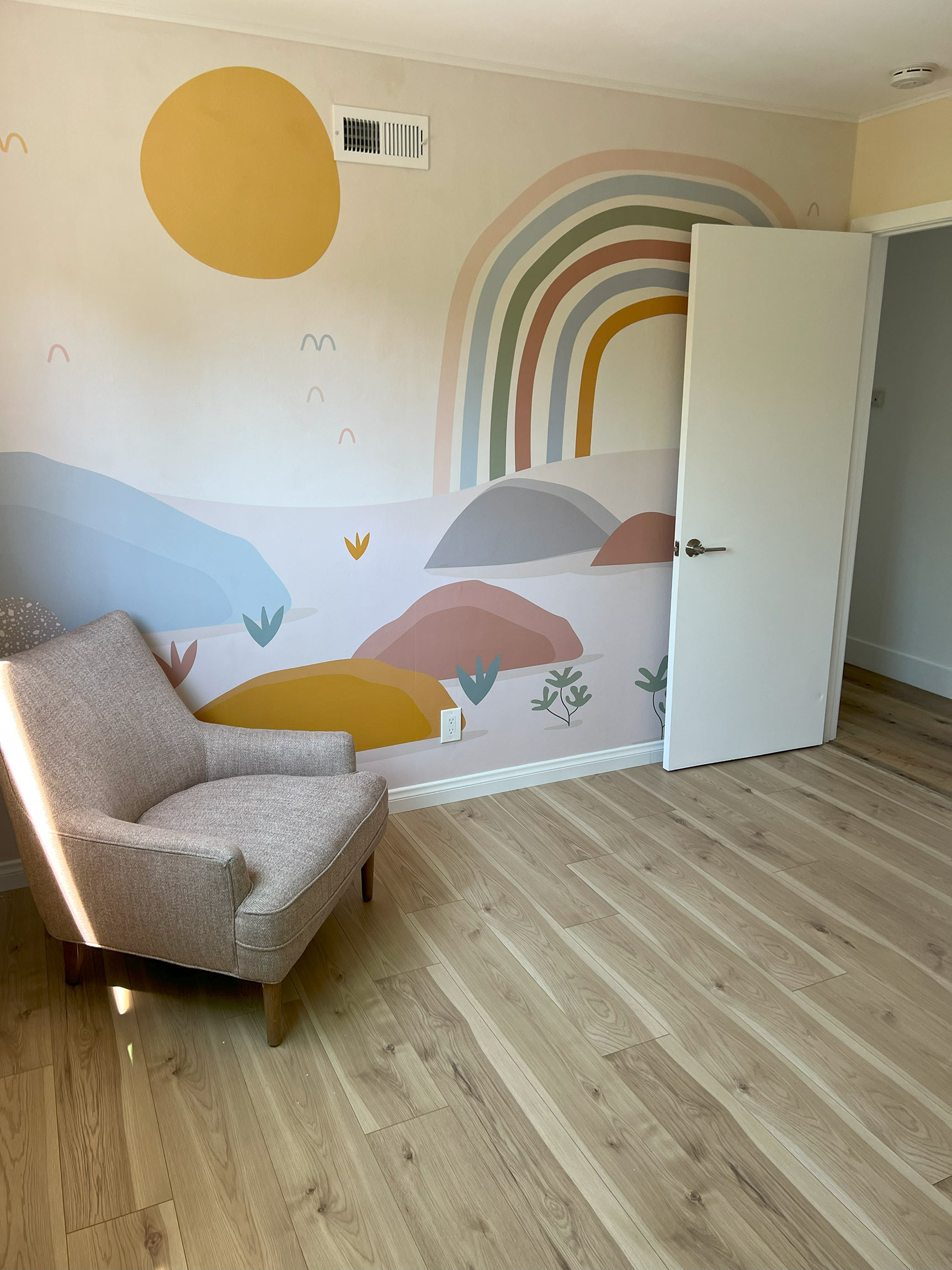 bedroom remodeling, painted wall, floor installation, a chair