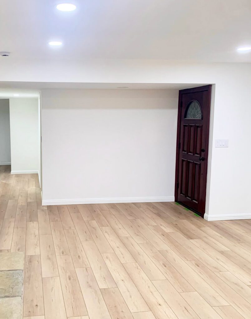 very light gray custom painted wall and a door