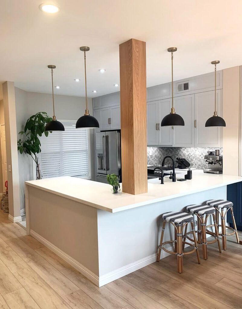 kitchen remodeling, white counter, new lights, walls, and faucet